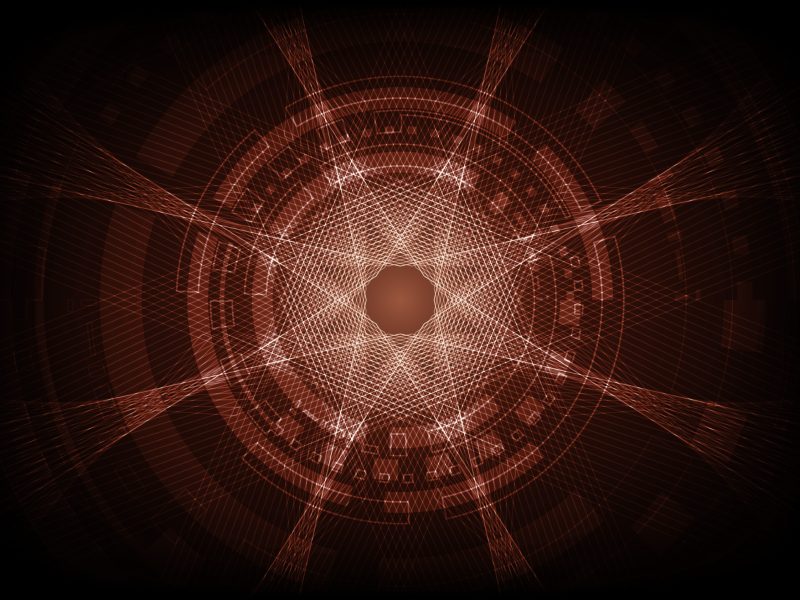 Abstract graphic of a circular hub with spokes in orange