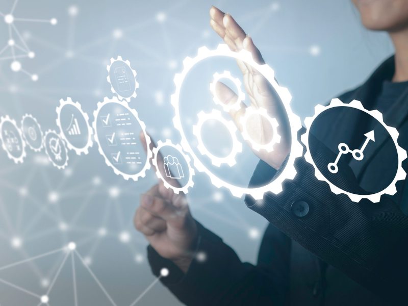 Person and graphics illustrating concurrent design efficiency