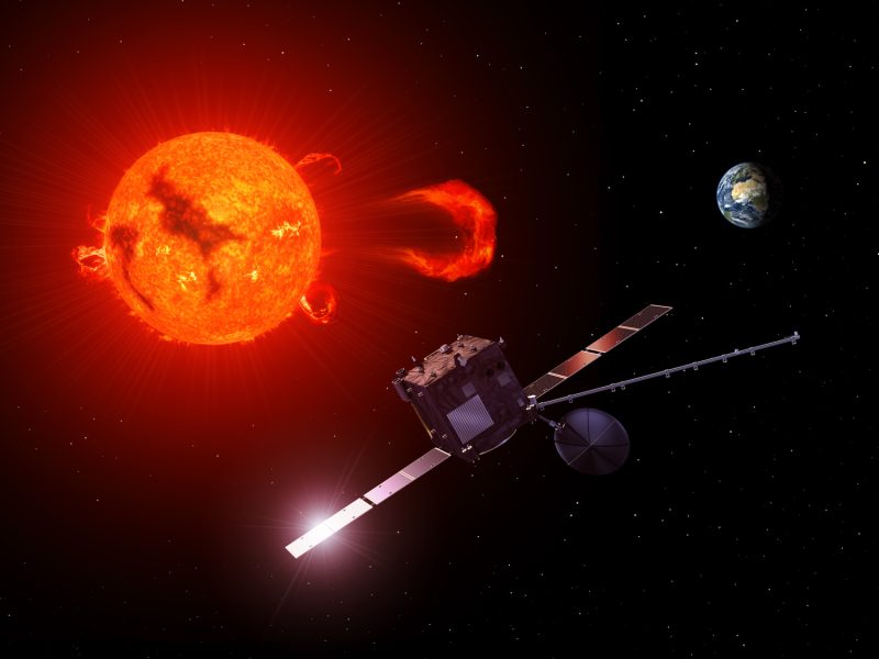 Artist's impression of ESA's Vigil spacecraft near the sun which is emitting a solar flare
