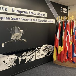 Poster at ESA's ESEC centre with ESA member state flags next to it