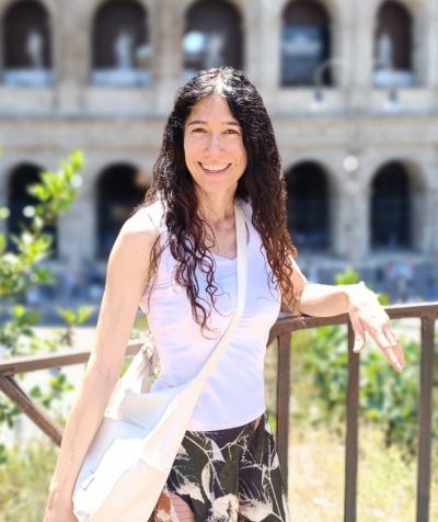 Francesca from Starion in front of the Coliseum in Rome