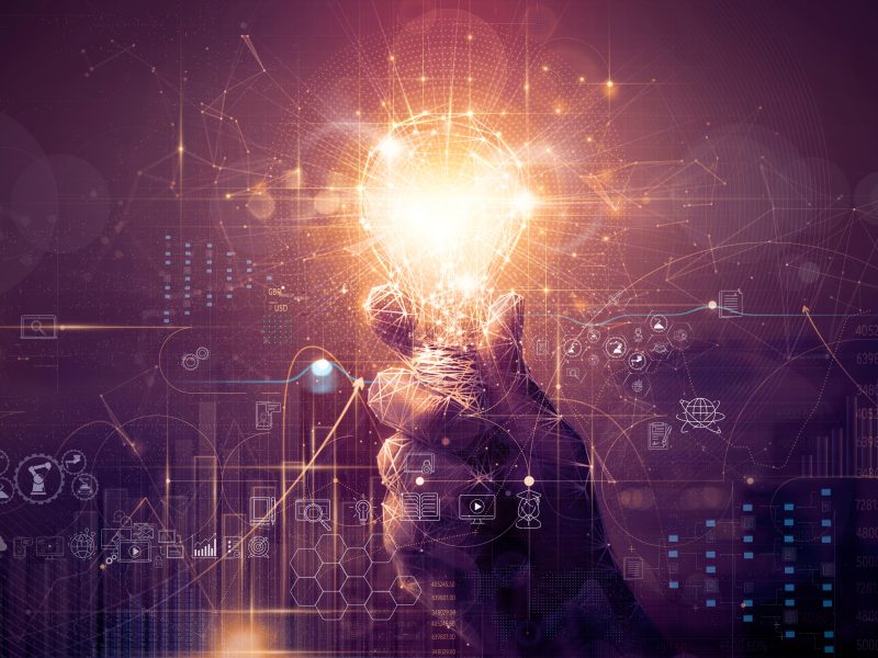 Graphic of a hand holding a lightbulb with icons