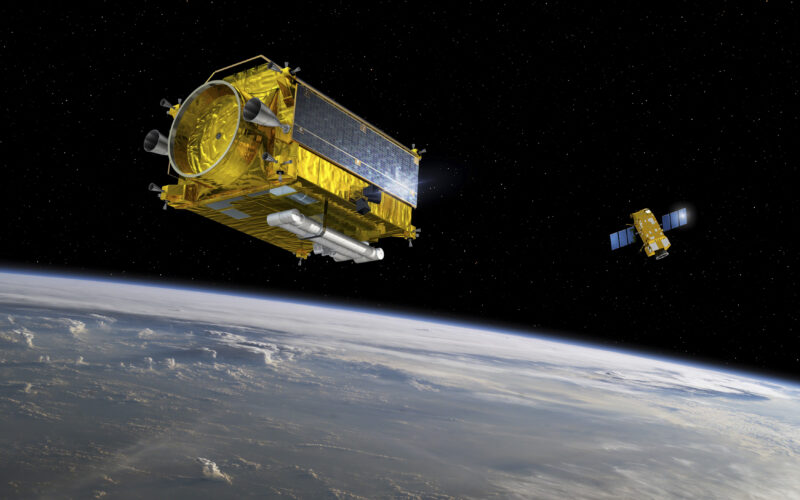Artist's impression of two spacecraft over Earth
