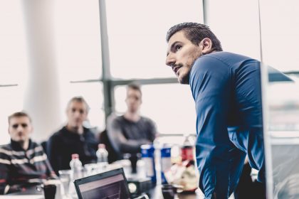men looking at presentation